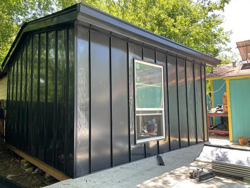 Black standing seam metal wall panels for Roof Inspection in Audubon