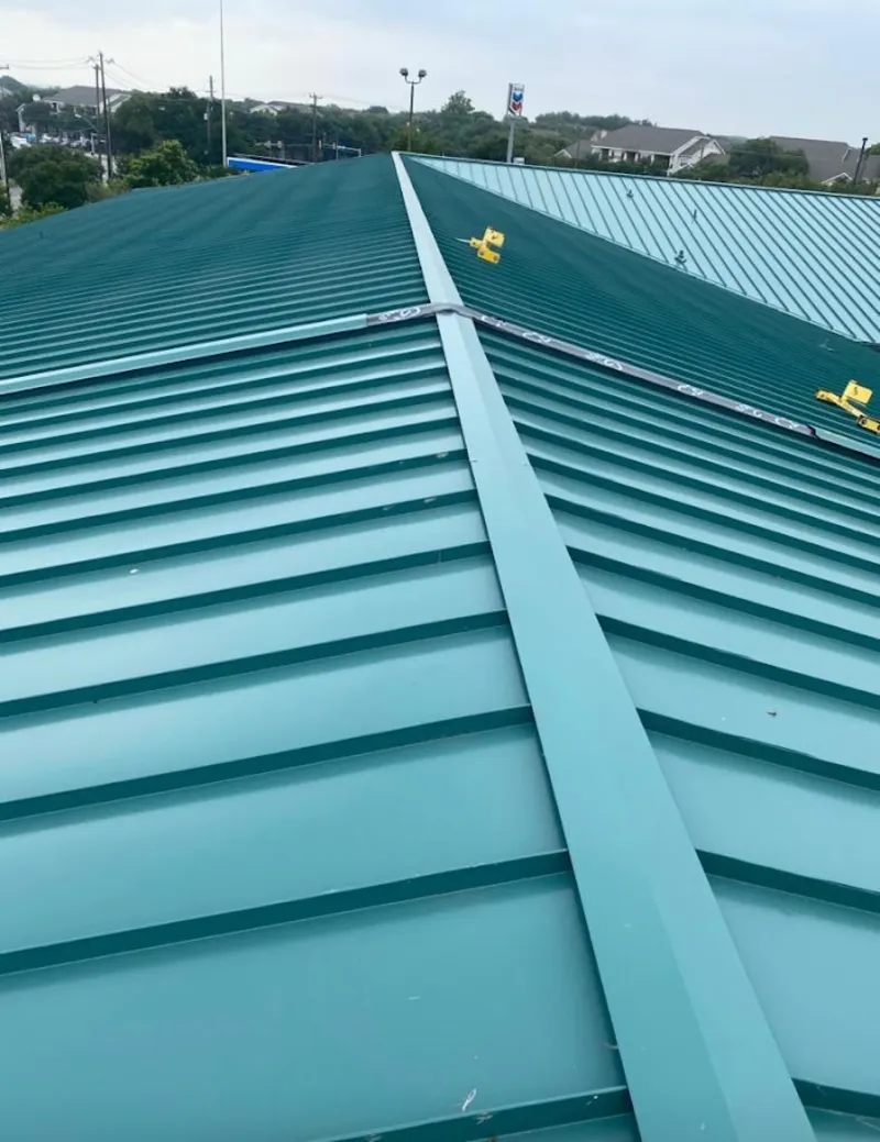 Green commercial metal roof ridge and valley for Metal Roof Repair in Audubon